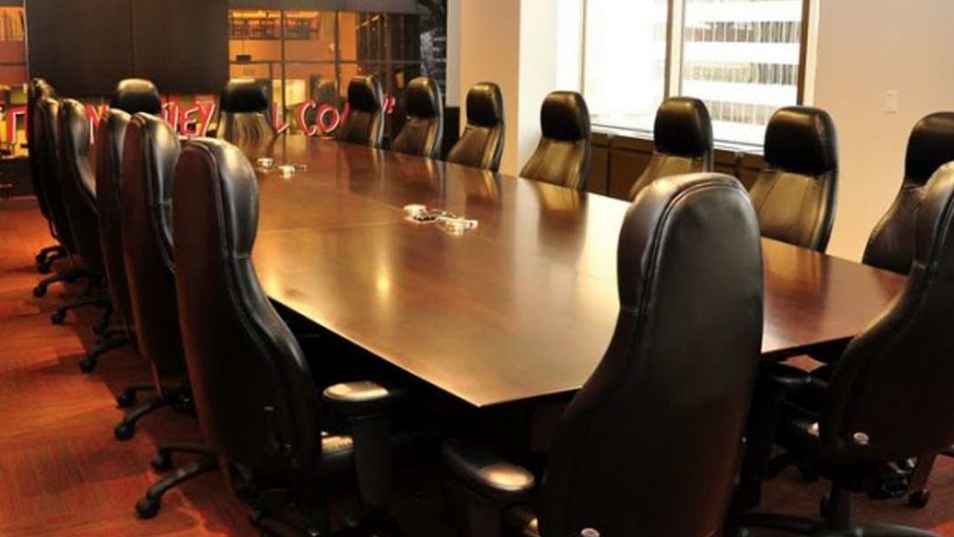 Corporate Office Furniture Design Denver: Quiznos Corporate Headquarters espresso conference room table with black leather chairs